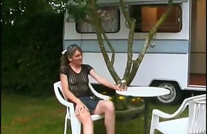 Youg french visti an old bungle in her camping car