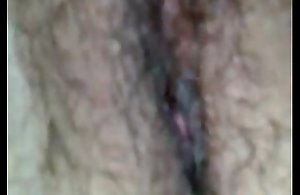 Mature woman in a hairy pussy