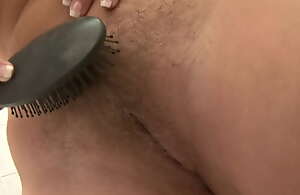 MILF Fills Her Hairy Hole With Some Hard