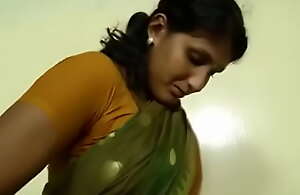An indian mallu hot neighbor bhabhi teaching how to show upon saree