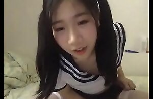 Young Chinese Oriental student playing in