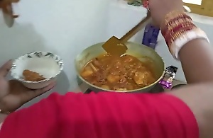 Indian Sheila Cooking Chicken In Larder