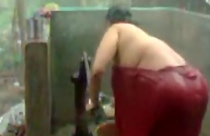 big beautiful non-specific indian bhabhi taking shower from pump